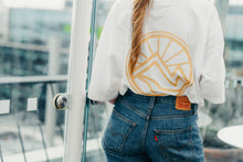 Load image into Gallery viewer, Simplicity Meets Sustainability 🌞
The Eco Luxe Oversized T-Shirt in white is your go-to for clean, conscious style. With Fair Wear, PeTA Vegan, and Climate Neutral certifications, this piece is as pure as it looks—perfect for layering or as a standalone statement of sustainable fashion