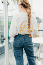 Load image into Gallery viewer, Simplicity Meets Sustainability 🌞
The Eco Luxe Oversized T-Shirt in white is your go-to for clean, conscious style. With Fair Wear, PeTA Vegan, and Climate Neutral certifications, this piece is as pure as it looks—perfect for layering or as a standalone statement of sustainable fashion