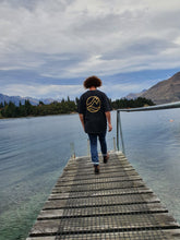 Load image into Gallery viewer, Maru wearing our stonewash tee in size Large
